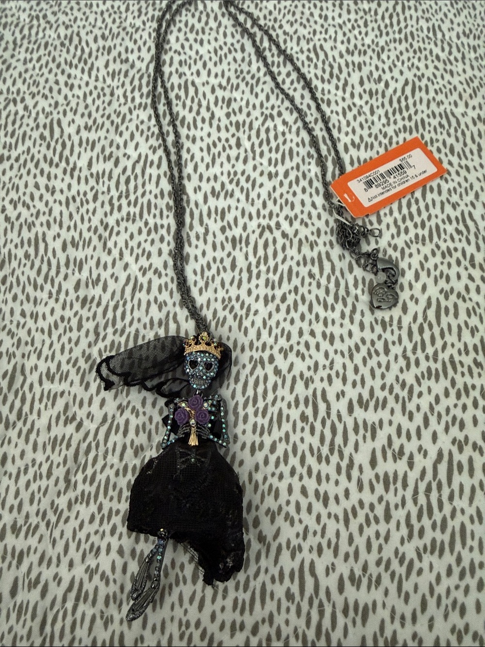 Betsey Johnson Black and Purple Skeleton Doll Necklace